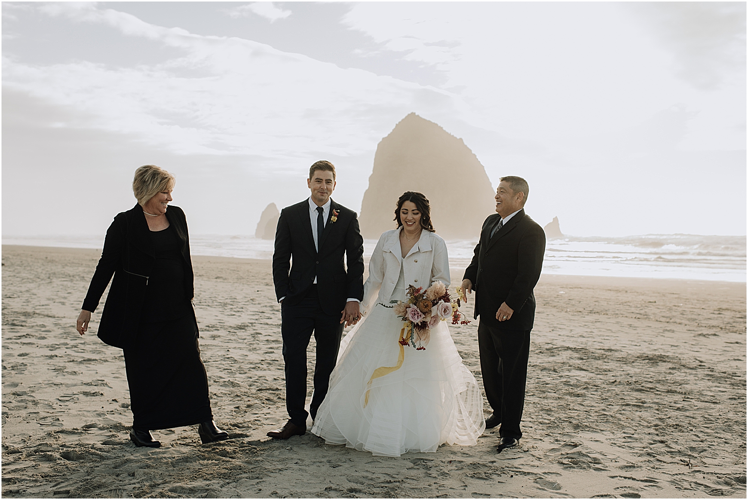cannon beach elopement on the majestic oregon coast with naomi levit wedding photographer